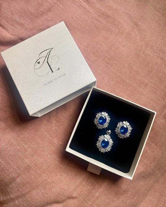 ALAERE Royal Sapphire Halo Pendant Set