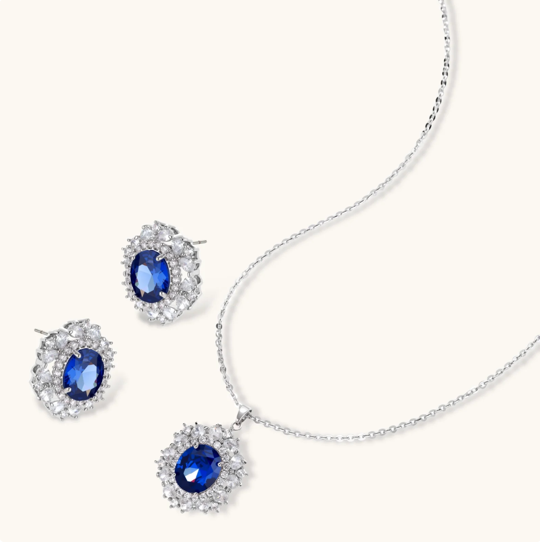 ALAERE Royal Sapphire Halo Pendant Set